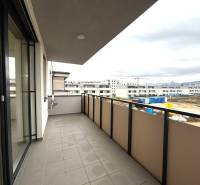 The balcony offers a view of the construction on Vladimíra Predmerského Street in Trenčín.