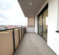 The balcony of a 3-room apartment on Vladimíra Predmerského in Trenčín with a view of the surroundings.