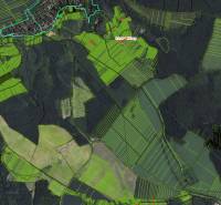 Aerial view of agricultural and forest lands around Nemčinian.