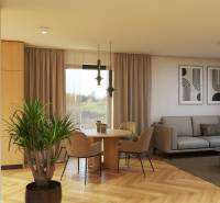 The interior of a family house on Špačince Street includes a dining table, a sofa, and decorative plants.