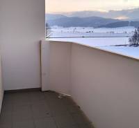 The balcony of a 2-room apartment on Slobody Street in Turčianske Teplice with a view of the countryside.