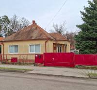 Family house in Nová Ves nad Žitavou on Nová Ves nad Žitavou street with a distinctive red fence.