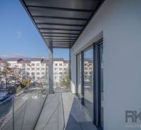 A balcony with a view of apartment buildings on Francisciho Street in Poprad, from a 2-room apartment.