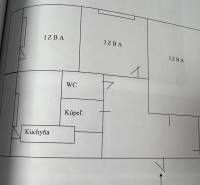 Floor plan of a 3-room apartment with a kitchen, bathroom, and toilet.