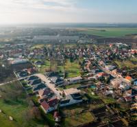 Aerial view of houses and gardens in the village of Vlčkovce, Land - residential.