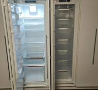Refrigerator and freezer with wooden floor decor in a 3-room apartment.