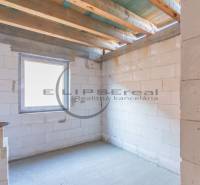 Interior of a building with white bricks and a window in the style of Veľké Leváre.