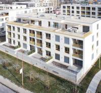 A view of apartment buildings on Cukrovarská Street in Trnava, with greenery around.