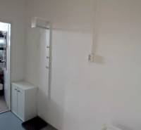 Warehouses and halls with shelves and storage space.