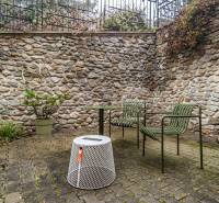 Stone wall on the terrace overlooking the garden, next to a 4-room apartment on Tichá Street, Bratislava - Staré Mesto.