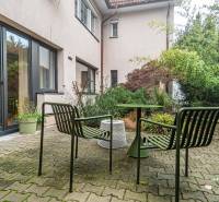 Exterior of a 4-room apartment on Tichá Street in Bratislava - Old Town with garden furniture.