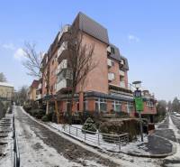 An apartment building on Vansová Street in Bratislava-Staré Mesto covered with a thin layer of snow.