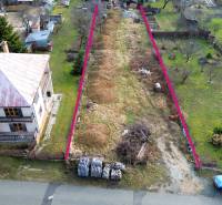 Plots - housing in Nováčany with a house, garden, and extensive grassy land.