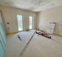 The interior of a family house in the renovation phase with tools and building materials.