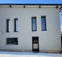 A family house on Gyňovská Street in Čaňa with a minimalist design and modern windows.