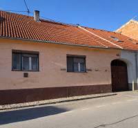A family house on Bratislavská Street in Svätý Jur with an older facade and a sloped roof.