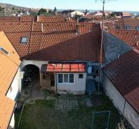 A family house on Bratislavská in Svätý Jur with a courtyard and red roofs.