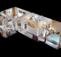 Layout of a 3-room apartment with wood-patterned flooring and furnishings.