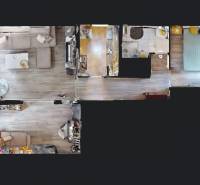 Floor plan of a 3-room apartment with wood-patterned flooring, including a living room and a bedroom.