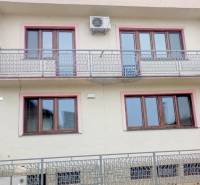 A building with balconies and air conditioning on Hodžova Street in Piešťany used as offices.