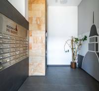 Mailboxes and modern decor in the hallway of the Residence by the Town Hall.