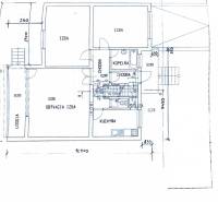 Floor plan of a family house with three rooms, a bathroom, and a kitchen.