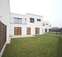 A family house on Legionárska Street in Trenčín with a lawn and fencing.