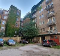 Parking lot near residential buildings on Grösslingova Street in Bratislava Old Town.
