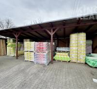 Warehouse with packages of building materials on Strojnická Street 10 in Ľubotice.