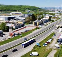 Aerial view of commercial land at Petrovianska 284 in Prešov with surrounding greenery.