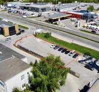 Aerial view of commercial land on Petrovianska Street in Prešov with a parking lot.