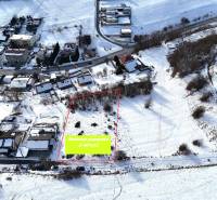Snow-covered residential plots in Horná Mičiná, ideal for your new home.