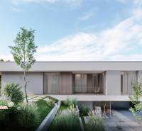 A two-story house with a green garden in Horná Mičiná. Residential plots.