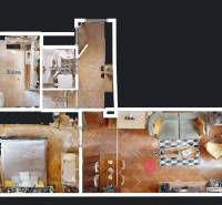 The floor plan shows the layout of a 2-room apartment, including flooring with a wooden design.