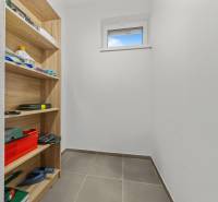 Storage space with shelves and a window in a 3-room apartment.
