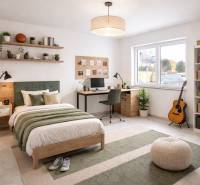 A room in a family house with a bed, a desk, shelves, and a guitar.