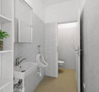 A restroom in a building with white tiles and an elegant sink.