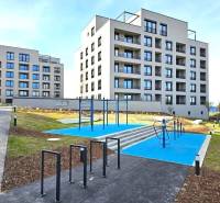 New apartment buildings on Mateja Encingera Street in Bratislava - Devínska Nová Ves with a playground.