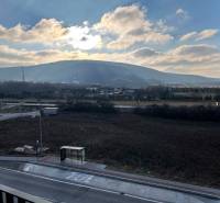 View of the field and hills from Mateja Encingera Street, Bratislava - Devínska Nová Ves.