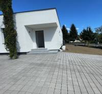 A family house in Michalovce on Vinianska Road with a terrace and lawn.