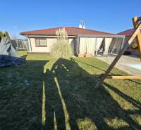 Family house on M. Terézie Street in Holíč with a lawn, terrace, and outdoor seating.