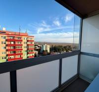 View from the balcony of a studio apartment on Štefánikova Street in Senica, overlooking the apartment buildings.