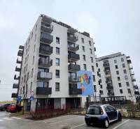 Apartment building in Bratislava on Pri Hrubej lúke street with a parking lot.