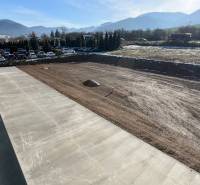 Reinforced area with a parking lot and gravel surface, Strečno, SNP, commercial premises.