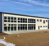 Commercial premises on SNP Street in Strečno with large glass facades.