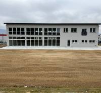 A two-story building on SNP Street in Strečno, suitable for commercial spaces.