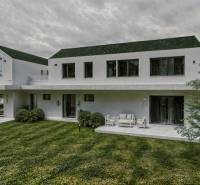 In Mlynica, a family house with a spacious terrace surrounded by greenery and trees.