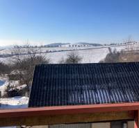 Snowy landscape in the town of Rudník from a family house on Rudník Street.