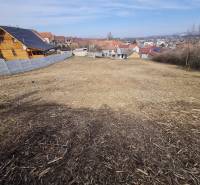 Plots - housing on Poľná Street in Banka with a view of the city and houses.