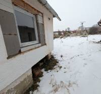 The exterior of a family house on Remeselnícka Street in Ľubica covered with snow.